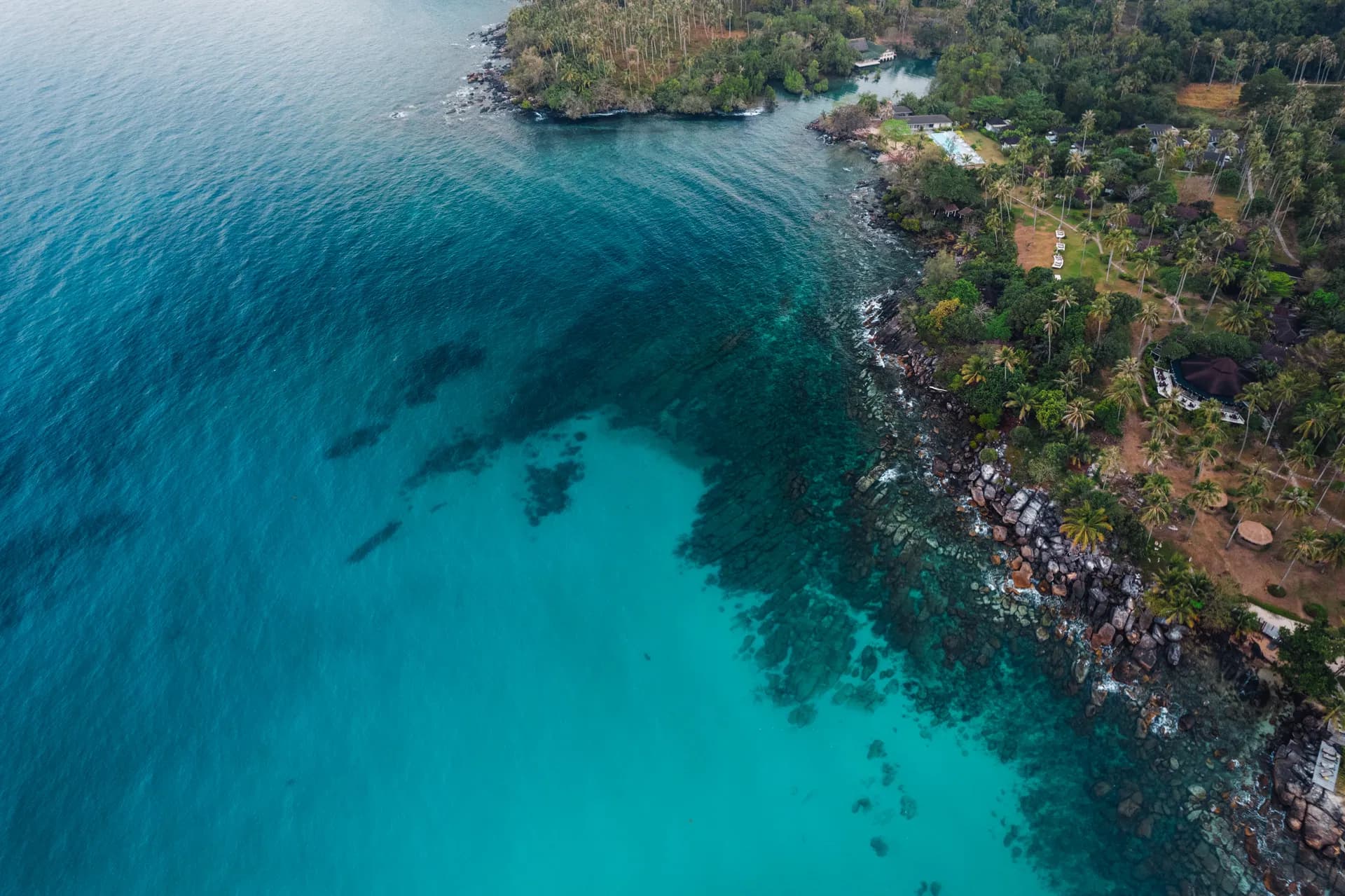 Crystal clear turquoise water under a blue sky