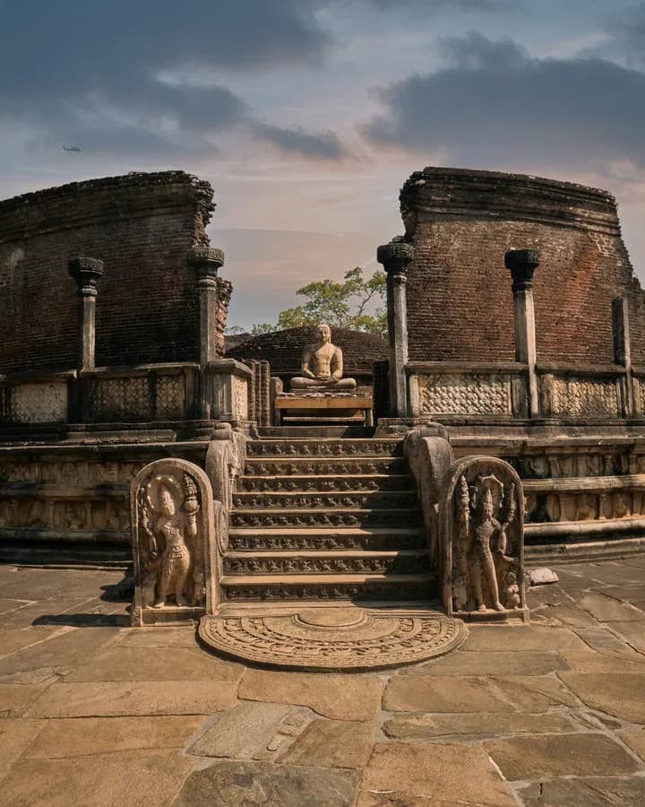 Ancient Buddhist temple ruins with Buddha statue